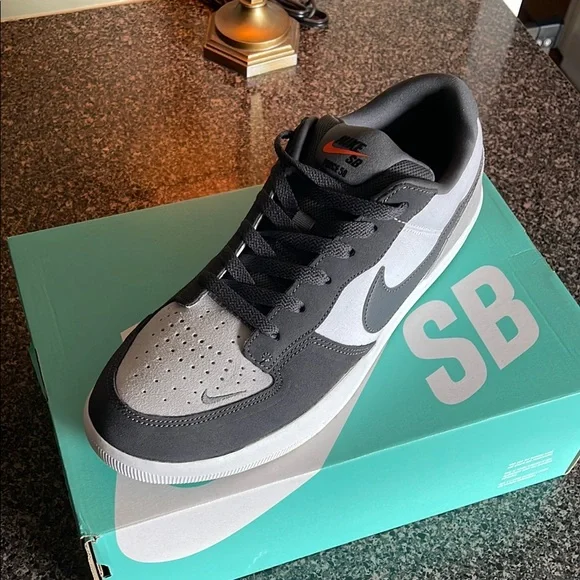 Nike | Shoes | Nike Black And Gray Lowtop Skate Shoes | Poshmark display picture 1